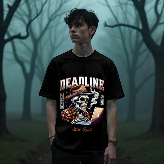 Person wearing a black t-shirt with a graphic design in a foggy forest setting