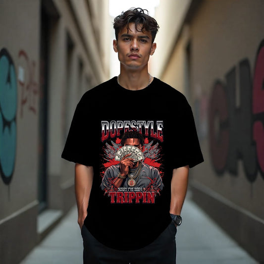 Person wearing a black t-shirt with graphic design and text in an urban setting