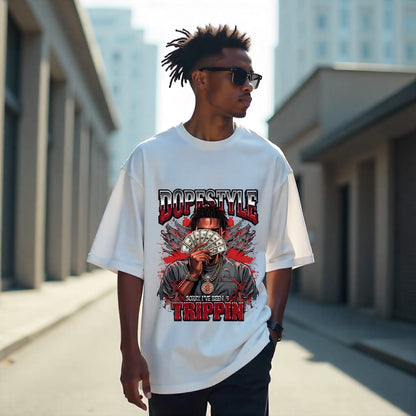 Person wearing a white t-shirt with a graphic design and text in an urban setting