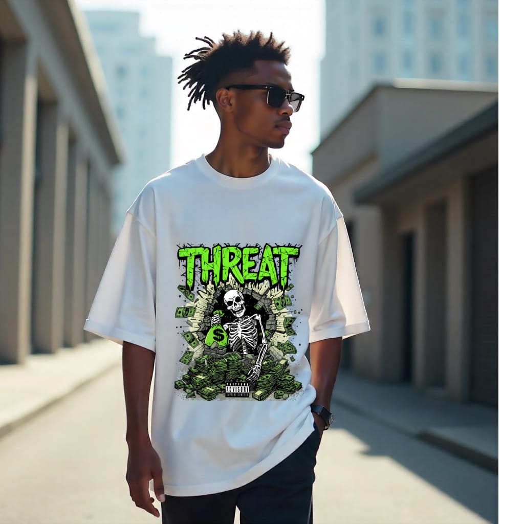 Person wearing a white t-shirt with a graphic design and the word 'THREAT' outdoors.