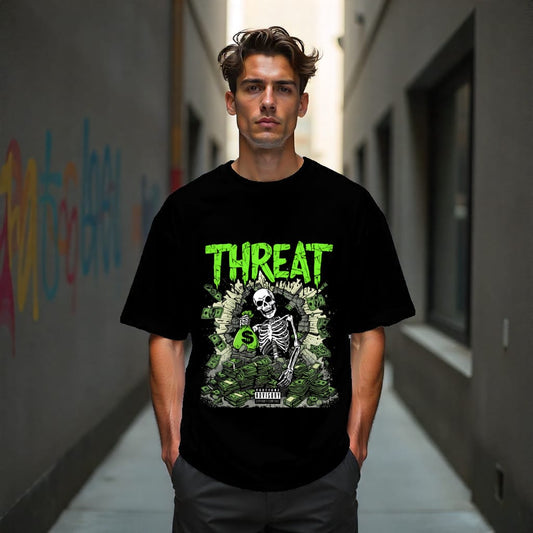 Man wearing a black t-shirt with a graphic design and the word 'THREAT' in green.