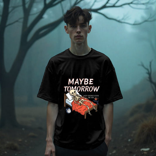 Person wearing a black t-shirt with a graphic design and text in a foggy forest setting
