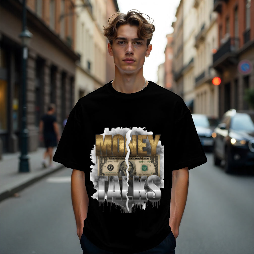Person wearing a black t-shirt with 'Money Talks' graphic on a city street.