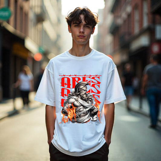 Person wearing a white t-shirt with a graphic design on a city street