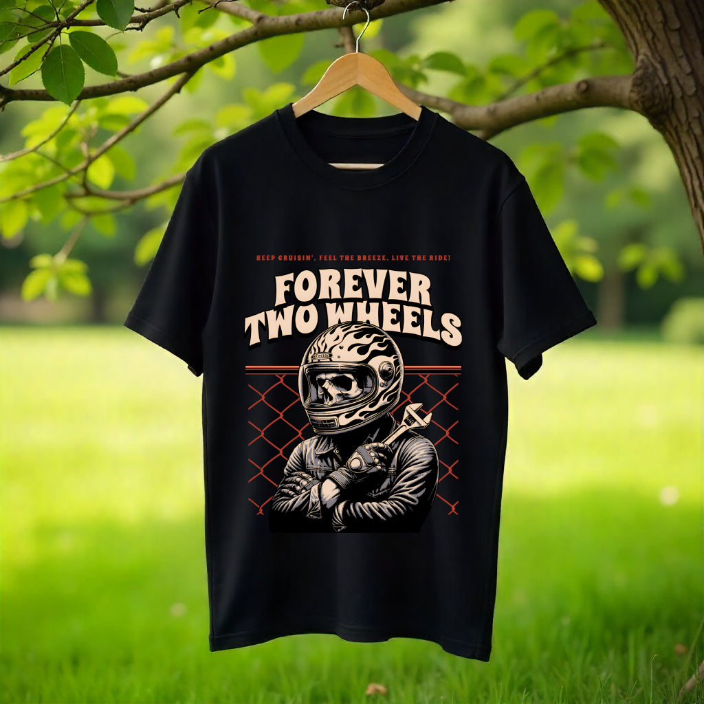 Black t-shirt with 'Forever Two Wheels' graphic on a hanger against a natural background